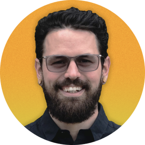 handome man with a beard smiling